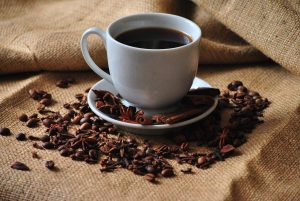 a cup of coffee, whole bean coffee, coffee beans-1414919.jpg